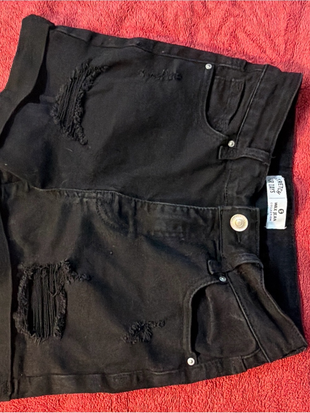 Wax Jean collection size small  Black Distressed shirts stretch for days 24”